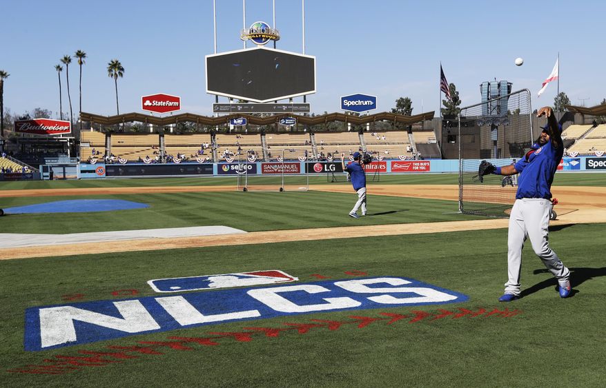 Chicago Cubs' Jason Heyward warms up before Game 3 of the National League baseball championship series against the Los Angeles Dodgers Tuesday, Oct. 18, 2016, in Los Angeles. (AP Photo/David J. Phillip)