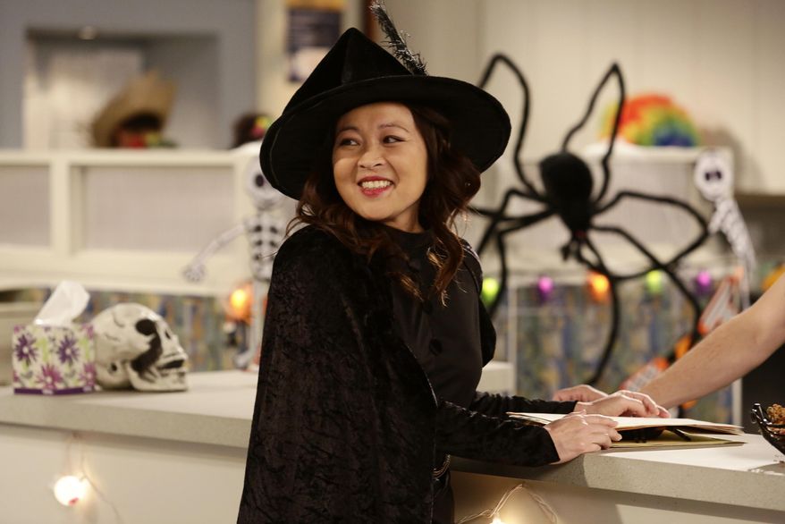 In this image released by ABC, Suzy Nakamura appears in a scene from the upcoming Halloween episode of "Dr. Ken," airing Oct. 21, on ABC. (Nicole Wilder/ABC via AP)