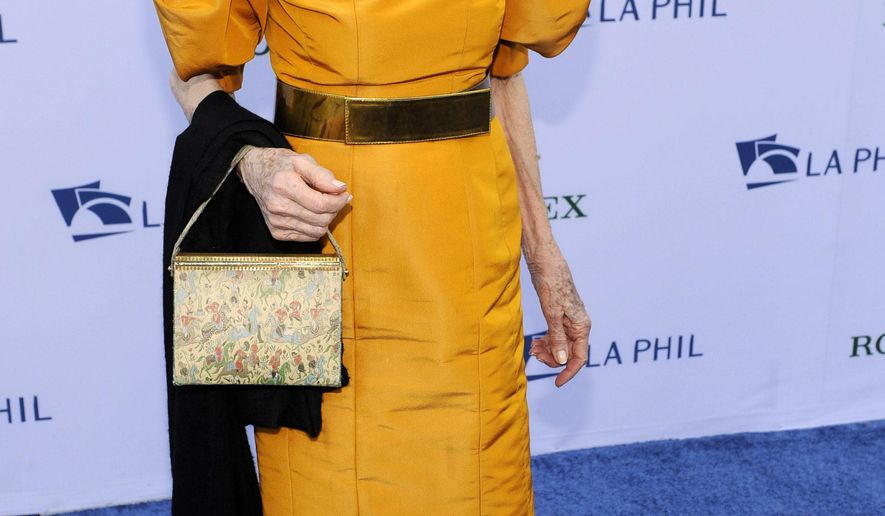 FILE - In this Sept. 27, 2011 file photo, Betsy Bloomingdale arrives at the Los Angeles Philharmonic Opening Night Gala in Los Angeles. Personal belongings of the late fashion icon, socialite and philanthropist Betsy Bloomingdale will be auctioned by Christie's in New York later this year and in the Spring of 2017. (AP Photo/Chris Pizzello, File)