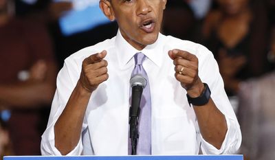 President Barack Obama gestures as he speaks at a campaign rally for Democratic presidential candidate Hillary Clinton at Florida Memorial University, Thursday, Oct. 20, 2016, in Miami Gardens, Fla. (AP Photo/Wilfredo Lee)