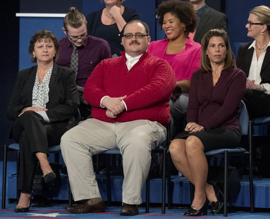FILE - In this Oct. 9, 2016, file photo, Kenneth Bone sits in the audience before the start of the second presidential debate at Washington University in St. Louis. Bone stars in a video released by sweater-maker Izod on Oct. 20, 2016. He says in the video that he doesn’t think he’s “going to continue to be internet famous forever,” but adds that he’s happy to have played his role in encouraging people to vote. (AP Photo/Andrew Harnik, File)