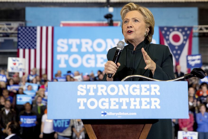 Democratic presidential candidate Hillary Clinton speaks at a rally at Cuyahoga Community College in Cleveland, Friday, Oct. 21, 2016. (AP Photo/Andrew Harnik)