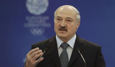 Belarus&#x27; President Alexander Lukashenko gestures while speaking at the European Olympic Committees General Assembly in Minsk, Belarus, Friday, Oct. 21, 2016. Lukashenko says his country is ready to host the 2019 European Games. (AP Photo/Sergei Grits)