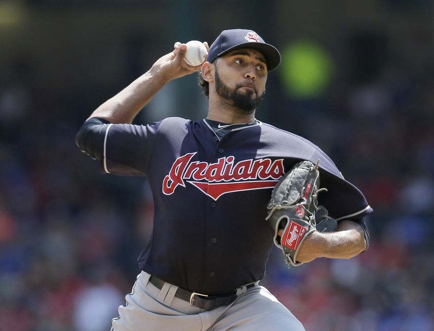 FILE - In this Aug. 28, 2016, file photo, Cleveland Indians starting pitcher Danny Salazar throws during the team's baseball game against the Texas Rangers in Arlington, Texas. Salazar, who hasn’t pitched since Sept. 9 because of tightness in his right forearm, has thrown well in recent bullpen sessions and might be able to pitch for the first time in this postseason. Manager Terry Francona said Friday, Oct. 21, that Salazar has “let it go” during some recent workout and has not been restricted to throwing only fastballs and change-ups. (AP Photo/LM Otero, File)