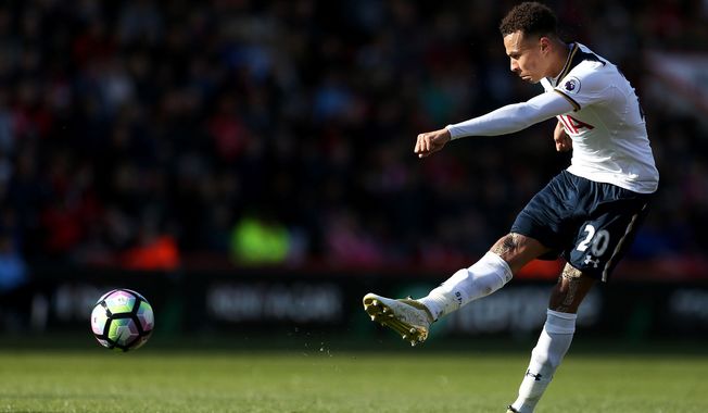 Tottenham Hotspur&#x27;s Dele Alli takes a shot during the English Premier League soccer match between AFC Bournemouth and Tottenham Hotspur at the Vitality Stadium, Bournemouth, England, Saturday, Oct. 22, 2016. (Steve Paston/PA via AP)