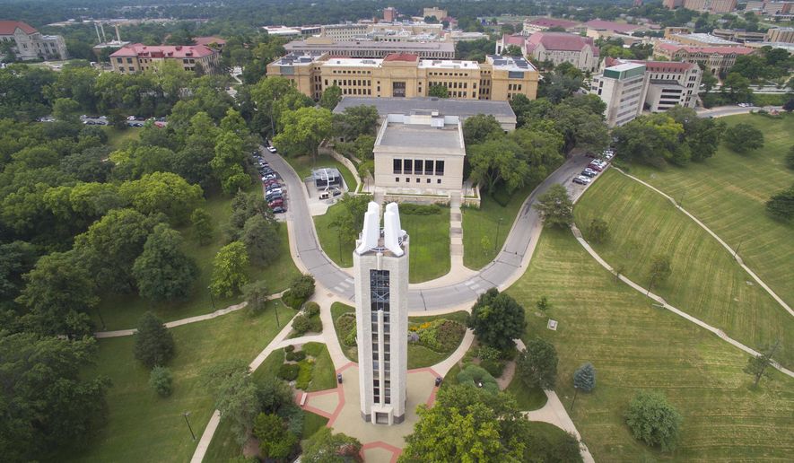 In this Aug. 4, 2015 photo, an aerial photo shows the University of Kansas in Lawrence, Kan. Since 2009, efforts have been underway to reduced the university&#39;s energy costs. KU reduced energy use enough over the past year to meet — and exceed — its overall energy consumption goal, according to the university&#39;s most recent campus-wide energy report. (Nick Krug/The Lawrence Journal-World via AP)