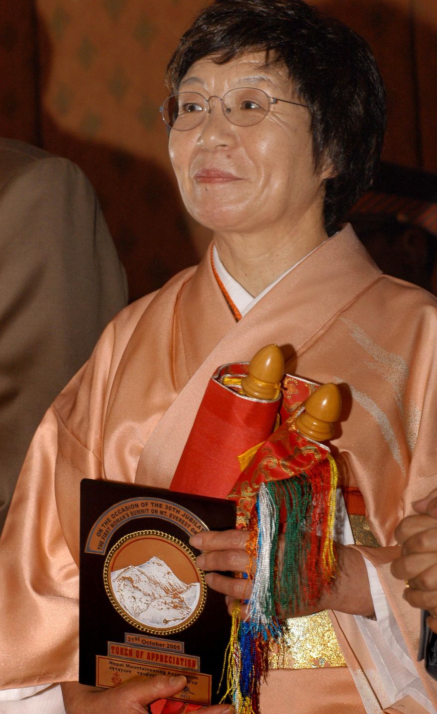 FILE - In this Oct. 31, 2005 file photo, Japanese mountaineer Junko Tabei looks on during a felicitation ceremony in Katmandu, Nepal. Tabei died Thursday, Oct. 20, 2016, of cancer at a hospital outside of Tokyo, according to Japanese media reports. She was 77. Tabei reached the summit of the world's highest mountain in 1975. In 1992, she also became the first woman to complete the "Seven Summits," reaching the highest peaks of the seven continents. (AP Photo/Binod Joshi)
