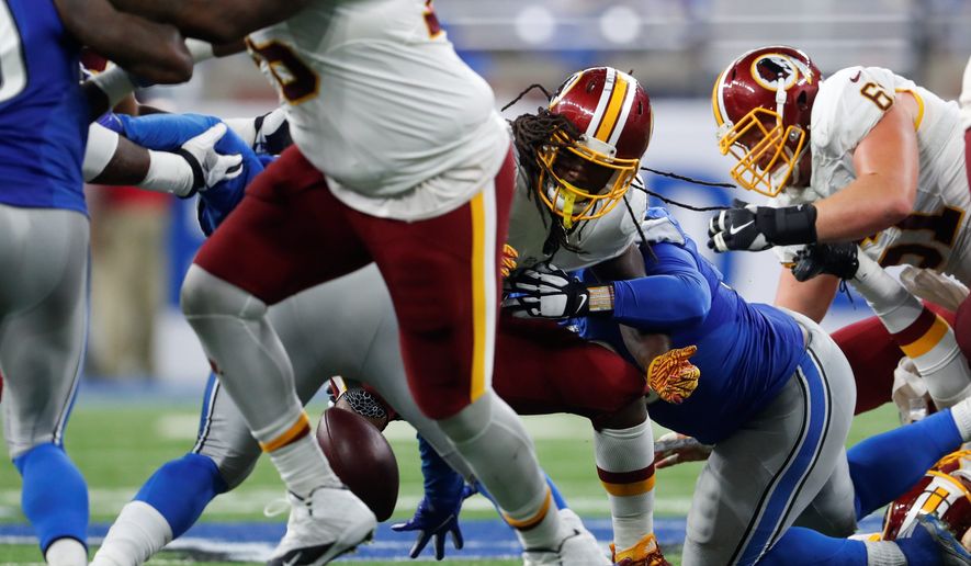 Washington Redskins running back Matt Jones fumbled twice on Sunday, including one at the Detroit Lions&#39; 7-yard line. (Associated Press)