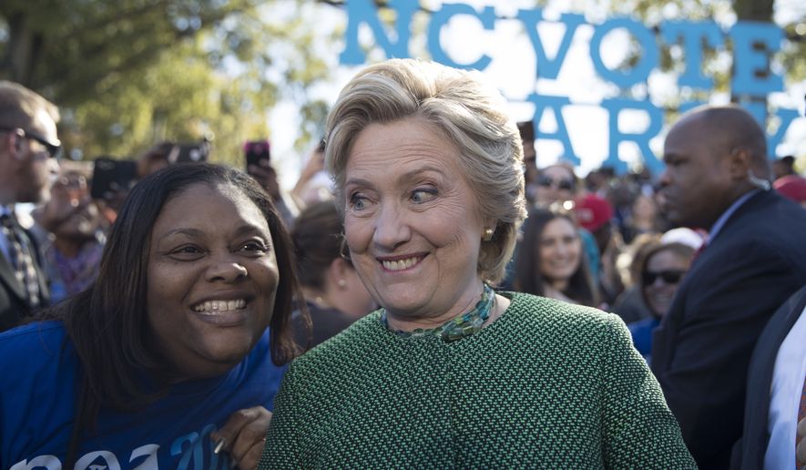 Democratic presidential candidate Hillary Clinton greets supporters during a campaign event at Saint Augustine&#39;s University, Sunday, Oct. 23, 2016, in Raleigh, N.C. (AP Photo/Mary Altaffer)