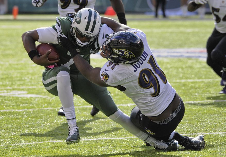 New York Jets quarterback Geno Smith (7) is sacked by Baltimore Ravens linebacker Matt Judon (91) during the second quarter of an NFL football game, Sunday, Oct. 23, 2016, in East Rutherford, N.J. (AP Photo/Bill Kostroun)