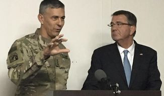 Army Lt. Gen. Stephen Townsend, the top U.S. Commander in Iraq, and Defense Secretary Ash Carter brief reporters in Irbil, Iraq, Sunday, Oct. 23, 2016 on the battle to retake Mosul from Islamic State militants. Carter visited the area for a closer look at the fight against the Islamic State group and to hear from Kurdish leaders. (AP Photo/Lolita Balder)