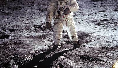 Astronaut Buzz Aldrin, lunar module pilot, walks on the surface of the Moon near the leg of the Lunar Module (LM) &quot;Eagle&quot; during the Apollo 11 exravehicular activity (EVA). Astronaut Neil A. Armstrong, commander, took this photograph with a 70mm lunar surface camera. While astronauts Armstrong and Aldrin descended in the Lunar Module (LM) &quot;Eagle&quot; to explore the Sea of Tranquility region of the Moon, astronaut Michael Collins, command module pilot, remained with the Command and Service Modules (CSM) &quot;Columbia&quot; in lunar orbit.