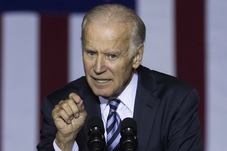 Vice President Joe Biden campaigns for Democratic presidential candidate Hillary Clinton at the Sinclair Community College Automotive Technology Building, Monday, Oct. 24, 2016, in Dayton, Ohio. (AP Photo/John Minchillo)