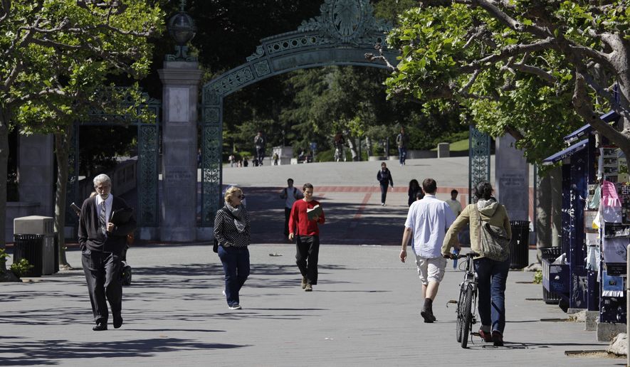 In this June 1, 2011, file photo, people walk through Sproul Plaza near the Sather Gate on the University of California, Berkeley campus in Berkeley, Calif. The university suspended a class on Sept. 13, 2016, amid complaints that it shared anti-Semitic viewpoints and was designed to indoctrinate students against Israel. (AP Photo/Eric Risberg, File)