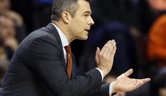 FILE - In this March 27, 2016, file photo, Virginia&#39;s head coach Tony Bennett reacts to a play during the second half of a college basketball game against Syracuse in the regional finals of the NCAA Tournament, in Chicago. Virginia  will enter this season expected to contend for the Atlantic Coast Conference championship, and for whom the way last season ended has been a motivating force for months. (AP Photo/Nam Y. Huh, File)