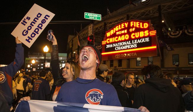 FILE - In this Oct. 22, 2016, file photo, Chicago Cubs fans celebrate outside Wrigley Field after the Cubs defeated the Los Angeles Dodgers 5-0 in Game 6 of baseball&#x27;s National League Championship Series in Chicago. Fans who are hoping to see the Cubs play in the World Series for the first time since 1945 are finding that if they want a seat it will cost them what their grandparents paid for their houses. (Ashlee Rezin/Chicago Sun-Times via AP File)