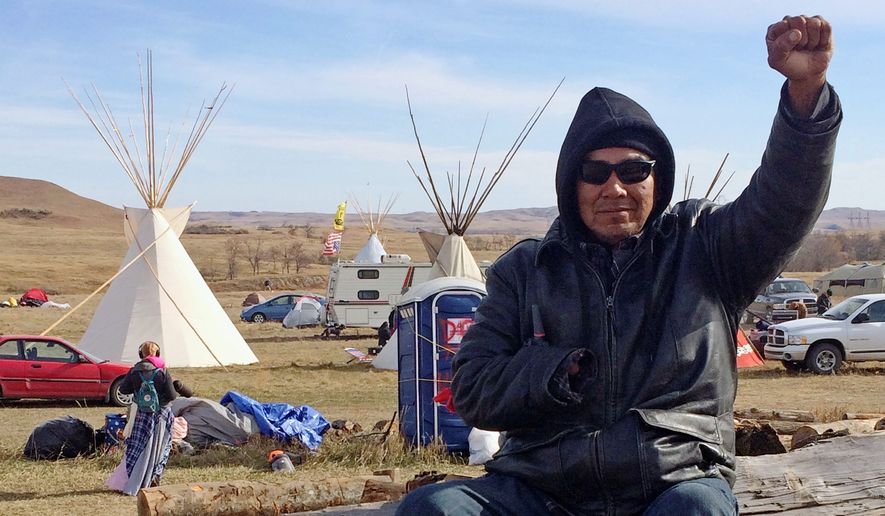 The dispute over the Dakota Access oil pipeline expanded off Indian reservations to private land purchased by the pipeline builders. (Associated Press)