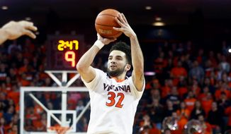 Virginia guard London Perrantes gets &quot;a little knot inside my stomach&quot; when he thinks about last year&#39;s regional final loss. (Associated Press)