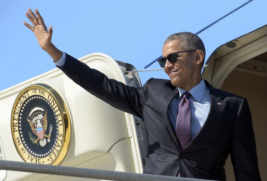 President Barack Obama waves before boarding Air Force One at Los Angeles International Airport, Tuesday, Oct. 25, 2016. Obama spent a few days in Nevada and California campaigning for Democratic presidential candidate Hillary Clinton. (AP Photo/Susan Walsh)