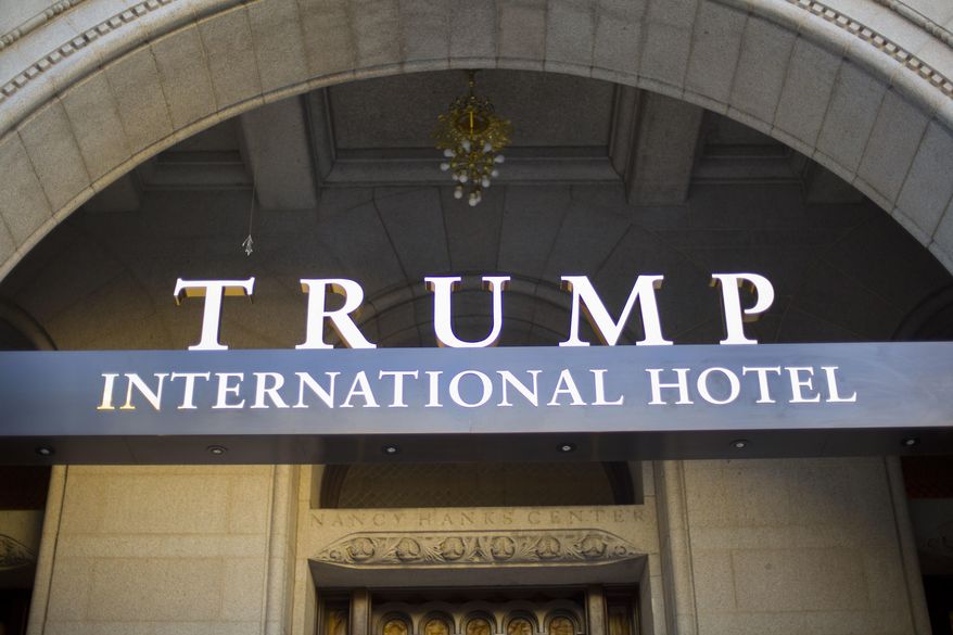 FILE - This Monday, Sept. 12, 2016, file photo, shows the exterior of the Trump International Hotel in downtown Washington. Republican presidential candidate Donald Trump has suggested that his presidential campaign will boost his hotel business and personal brand. But after a tumultuous run up to the election, including lewd statements about women and derogatory remarks about immigrants, there’s some evidence that Trump’s brand is being tarnished. (AP Photo/Pablo Martinez Monsivais, File)