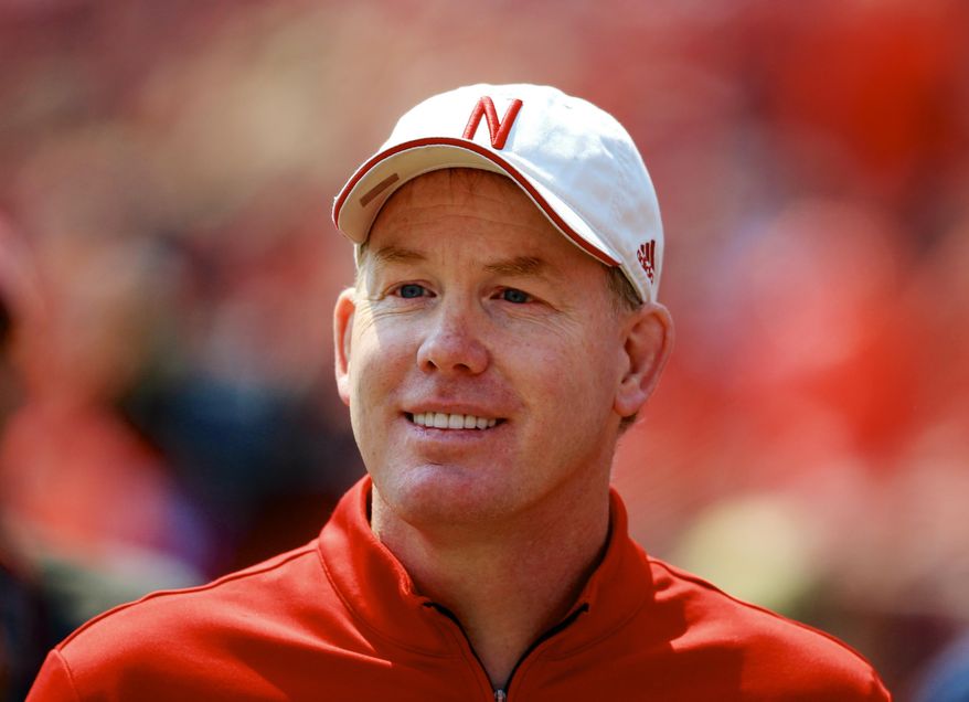 FILE - In this April 11, 2015 file photo, Nebraska Athletic Director Shawn Eichorst stands on the sidelines during a football game in Lincoln, Neb. The NCAA committee that crafted proposed football recruiting reforms, which includes the addition of early signing periods, wants to create more transparency and access for coaches and players in a process that has been accelerated in recent years, said a key member of the group. Eichorst told The Associated Press the football oversight committee created an interconnected and comprehensive package of reforms while acknowledging the new realities of recruiting. (AP Photo/Nati Harnik, File)