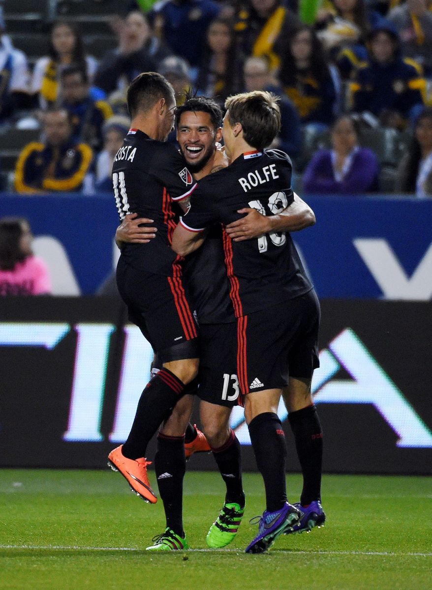 D.C. United playmaker Luciano Acosta has thrived in a new formation while veteran midfielder Lamar Neagle (center) has developed into a lethal presence off the bench. (Associated Press)