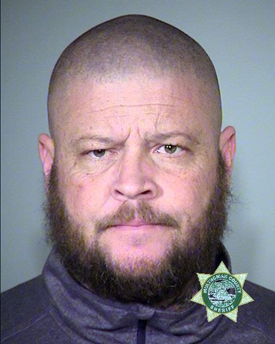 FILE - This file photo provided by the Multnomah County Sheriff's Office on Jan. 27, 2016, shows Brian Cavalier, one of the members of an armed group occupying the Malheur National Wildlife Refuge, as part of a dispute over public lands in the Western U.S. Ammon Bundy's bodyguard during the holdout, Cavalier pleaded guilty last summer. U.S. District Judge Anna Brown on Tuesday, Oct. 25, sentenced Cavalier, a defendant in the case, to time already served. (Multnomah County Sheriff via AP, File)