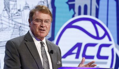 ACC Commissioner John Swofford answers a question during the Atlantic Coast Conference NCAA college basketball media day in Charlotte, N.C., Wednesday, Oct., 26, 2016. (AP Photo/Bob Leverone)
