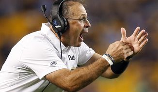 FILE - In this Oct. 1, 2016, file photo, Pittsburgh head coach Pat Narduzzi calls a timeout against Marshall during the first half of an NCAA college football game in Pittsburgh. Pitt and Virginia Tech meet on Thursday night with a chance to damage the other&#39;s ability to win the crowded ACC Coastal Division.  (AP Photo/Jared Wickerham, File)