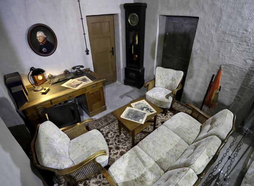 Interior view of a replica of the living room and office of Adolf Hitler pictured in a high-rise bunker, not the original so called 'Fuehrer's-Bunker', in Berlin, Germany, Thursday, Oct. 27, 2016. The room is part of an exhibition, located in a World War II high-rise bunker, which offers an overview of the history of Hitler's bunker and the end of the war. (AP Photo/Michael Sohn)