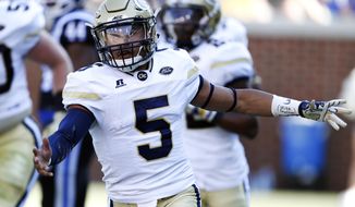 Georgia Tech quarterback Justin Thomas reacts after scoring a touchdown against Duke in the first half of an NCAA college football game Saturday, Oct. 29, 2016, in Atlanta. (AP Photo/John Bazemore)