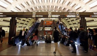 The head of the D.C. Metro rail system said that, in order to eliminate a budget shortfall, fares will be hiked and workers will be faced with layoffs. At the same time, Maryland, Virginia and District governments will have to pay more into the system. (Associated Press) **FILE**