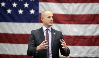 FILE - In this Oct. 21, 2016 file photo, Independent presidential candidate Evan McMullin speaks during a rally in Draper, Utah. Two months after he jumped into the presidential race as a political unknown, McMullin is surging in Utah polls and drawing large crowds of Republican-leaning voters fed up with Donald Trump&#39;s crudeness and antics.  (AP Photo/Rick Bowmer, File)