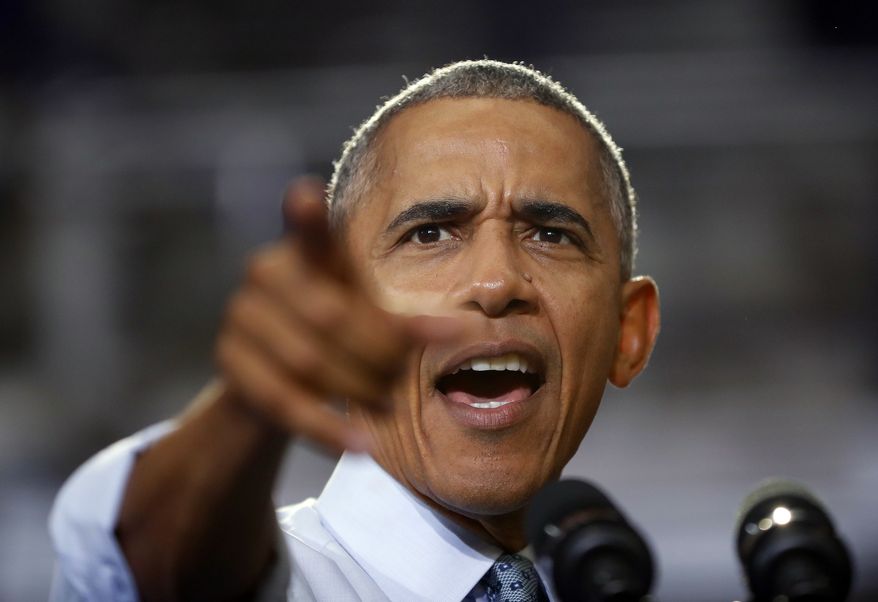 President Barack Obama points to members of the audience while speaking at Capital University Field House in Columbus, Ohio, Tuesday, Nov. 1, 2016.  Obama is kicking off a week of campaigning for Democratic presidential candidate Hillary Clinton with a stop in battleground Ohio. (AP Photo/Pablo Martinez Monsivais)