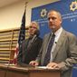 In this photo taken Tuesday, Nov. 1, 2016, San Francisco District Attorney George Gascon, left, and elections director John Arntz, right, discuss election security during a news conference in San Francisco. (AP Photo/Janie Har) ** FILE **