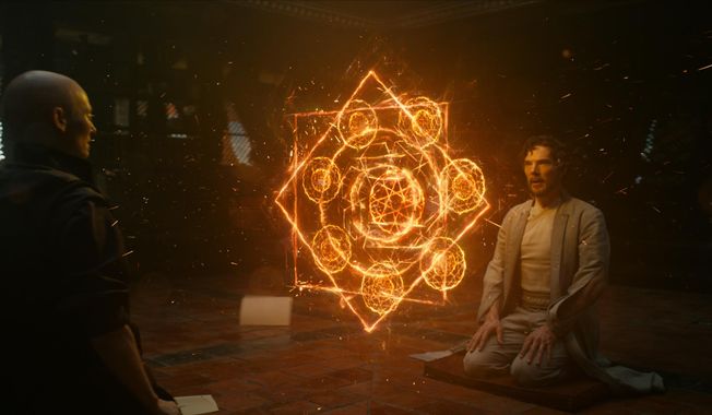 This image released by Disney shows Tilda Swinton, left, and Benedict Cumberbatch in a scene from Marvel&#x27;s &amp;quot;Doctor Strange.&amp;quot; (Disney/Marvel via AP)