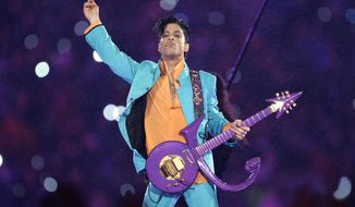 FILE - In this Feb. 4, 2007 file photo, Prince performs during the halftime show at the Super Bowl XLI football game at Dolphin Stadium in Miami. Universal Music Publishing Group has won the exclusive rights to administer Prince’s vast song catalog, from “Alphabet St.” to &amp;quot;Little Red Corvette.&amp;quot; (AP Photo/Chris O&#39;Meara, File)
