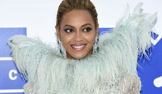 FILE - In this Aug. 28, 2016 file photo, Beyonce Knowles arrives at the MTV Video Music Awards at Madison Square Garden, in New York. Beyonce performed &amp;quot;Daddy Lessons,&amp;quot; Wednesday, Nov. 2, at the 50th annual CMA Awards in Nashville, Tenn. (Photo by Evan Agostini/Invision/AP, File)