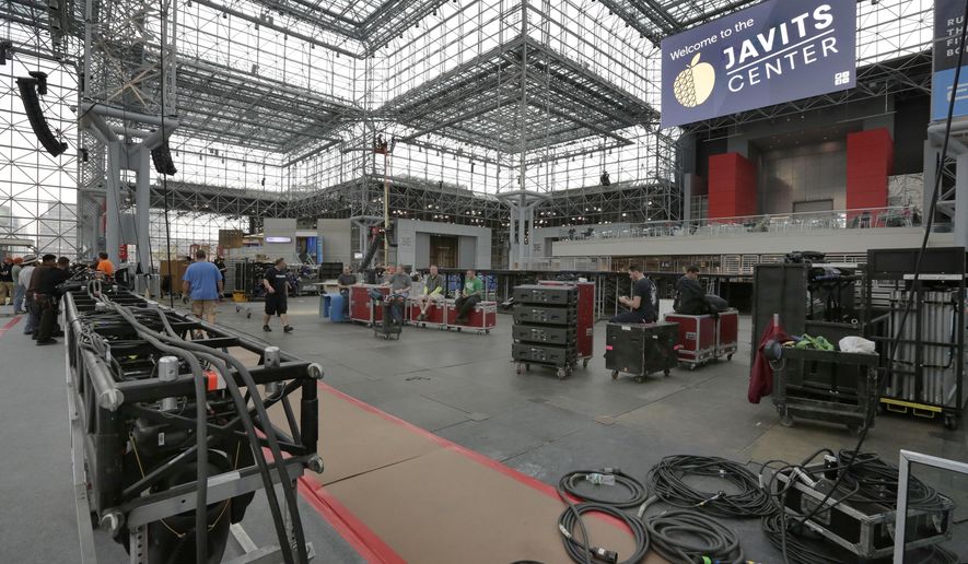 Workers prepare Democratic presidential candidate Hillary Clinton's election night venue, inside the Jacob K. Javits Convention Center, in New York, Thursday, Nov. 3, 2016. New York City is preparing for an election night like few others in its history, with both candidates planning "victory" parties about a mile apart in midtown Manhattan. (AP Photo/Richard Drew)