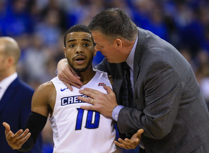 FILE- In this Feb. 9, 2016, file photo, Creighton coach Greg McDermott talks to point guard Maurice Watson Jr. (10) during a time out in the first half of an NCAA college basketball game against Xavier in Omaha, Neb. With one of the best point guards in the country and a strong cast around him, Creighton is poised to continue its climb in the Big East (AP Photo/Nati Harnik, file)