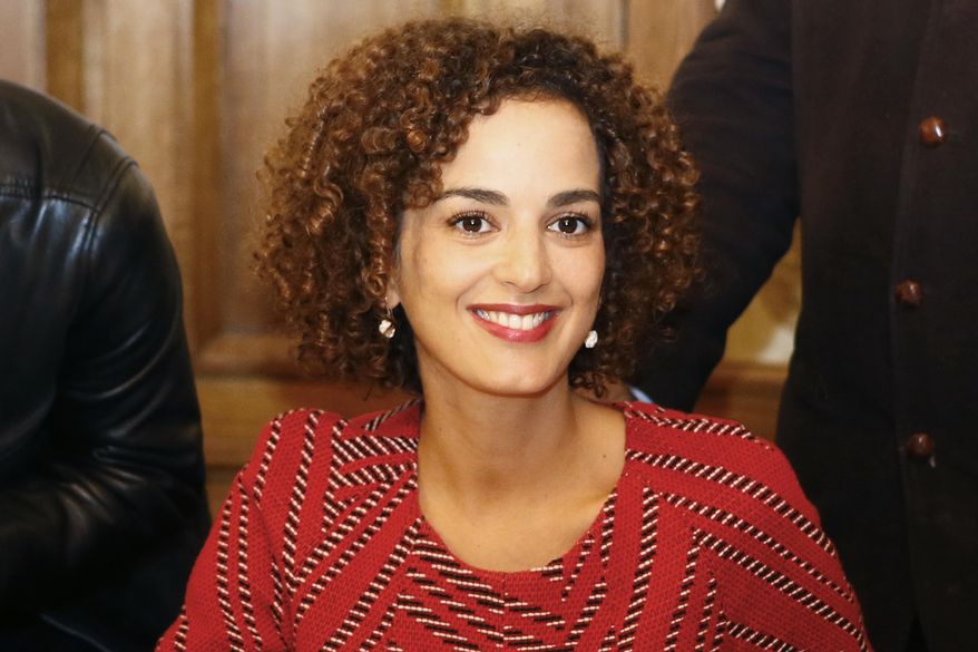 Leila Slimani smiles at the restaurant Chez Drouant after winnig the 2016 Goncourt literary prize for her book Chanson Douce (Sweet Song) , in Paris, Thursday Nov. 3, 2016. The Goncourt is France's most prestigious literary prize. (AP Photo/Francois Mori)