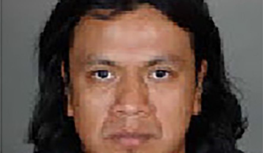This undated photo released by the Los Angeles Police Department shows Ricardo Augusto Utuy. Utuy was arrested on suspicion of fatally stabbing his co-worker's 3-year-old daughter at their workplace in downtown Los Angeles. (Los Angeles Police Department via AP)