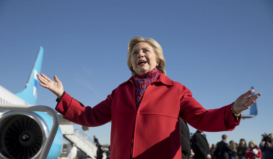 Democratic presidential candidate Hillary Clinton speaks to members of the media before boarding her campaign plane at Westchester County Airport in White Plains, N.Y., Monday, Nov. 7, 2016, to travel to Pittsburgh. (AP Photo/Andrew Harnik)