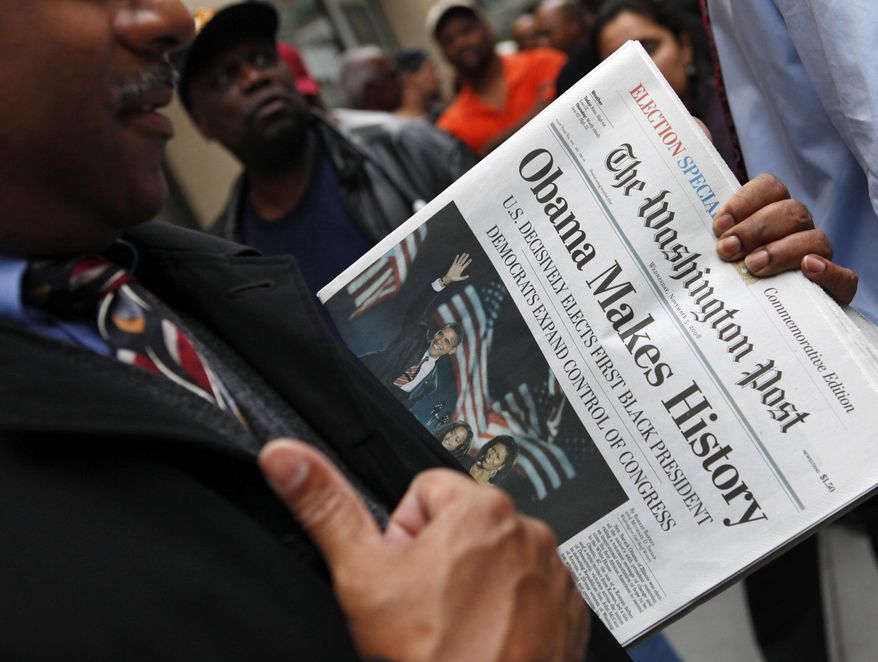 FILE - In this Nov. 5, 2008, file photo, people line up outside of the Washington Post newspaper to purchase special election editions in Washington. Newspapers are printing extra copies and setting up temporary retail stands after recalling the frenzy for an ink-stained memento after Barack Obama’s historic win in 2008. Many people now rely on Facebook and apps for news, but a screenshot doesn’t have quite the same romance as a newspaper’s front page. (AP Photo/Haraz N. Ghanbari, File)