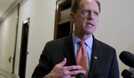 FILE - In this April 12, 2016 file photo, Sen. Patrick J. Toomey, R-Pa. speaks to reporters outside his office on Capitol Hill, in Washington.  (AP Photo/Manuel Balce Ceneta, File)