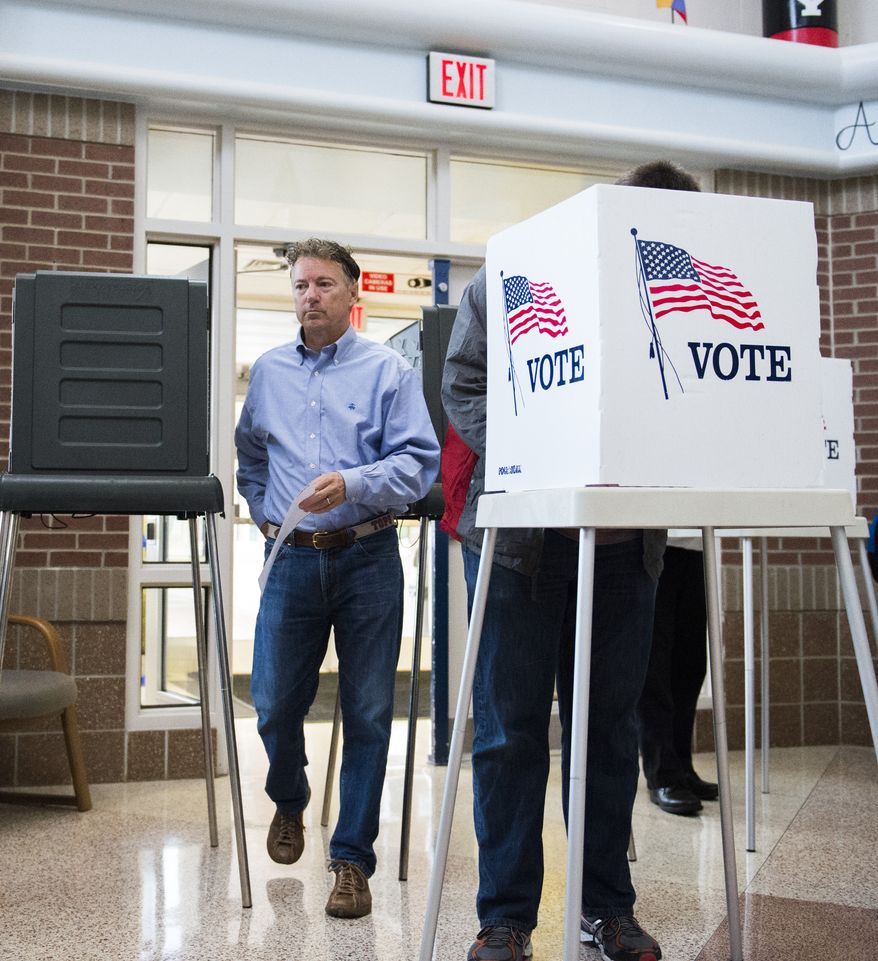 Sen. Rand Paul, R-Ky. casts his vote at Briarwood Elementary School in Bowling Green, Ky., Tuesday, Nov. 8, 2016. (AP Photo/Michael Noble Jr.)