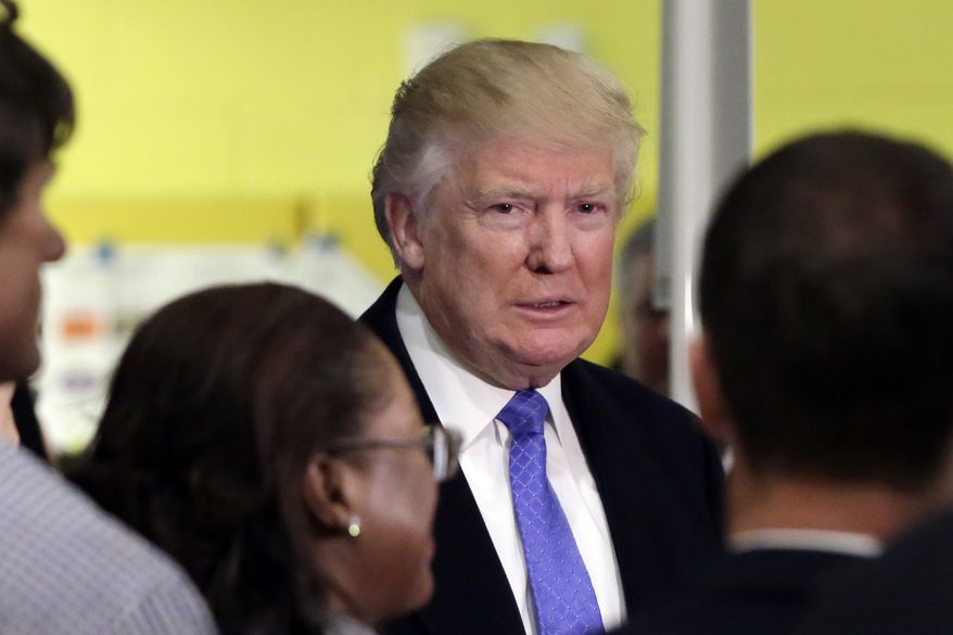 Republican presidential candidate Donald Trump prepares to leave after casting his ballot in New York, Tuesday, Nov. 8, 2016. (AP Photo/Richard Drew)