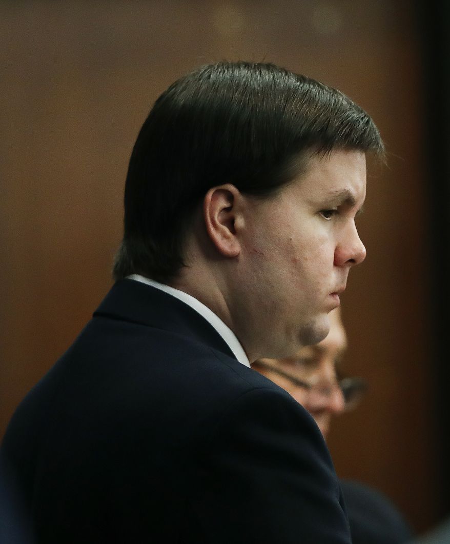 Justin Ross Harris, who is accused of intentionally killing his son in June 2014 by leaving him in the car in suburban Atlanta, stands during his murder trial Monday, Oct. 31, 2016, in Brunswick, Ga. (AP Photo/John Bazemore, Pool)