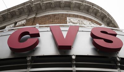 This Friday, Oct. 21, 2016, photo shows a CVS drugstore and pharmacy location in Philadelphia. CVS Health Corp.&#x27;s third-quarter profit jumped on a boost in prescription volume and higher retail sales, the company reported Tuesday, Nov. 8, 2016. (AP Photo/Matt Rourke)