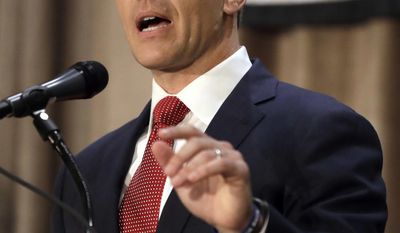 FILE - In this Sept. 30, 2016 file photo, Republican gubernatorial candidate Eric Greitens speaks during the first general election debate in the race for Missouri governor at the Missouri Press Association convention in Branson, Mo. (AP Photo/Jeff Roberson, File)